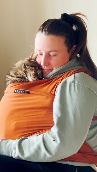 Senior Cat Turned Into A Literal Infant When She Got Adopted