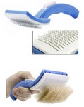 Self-cleaning grooming brush